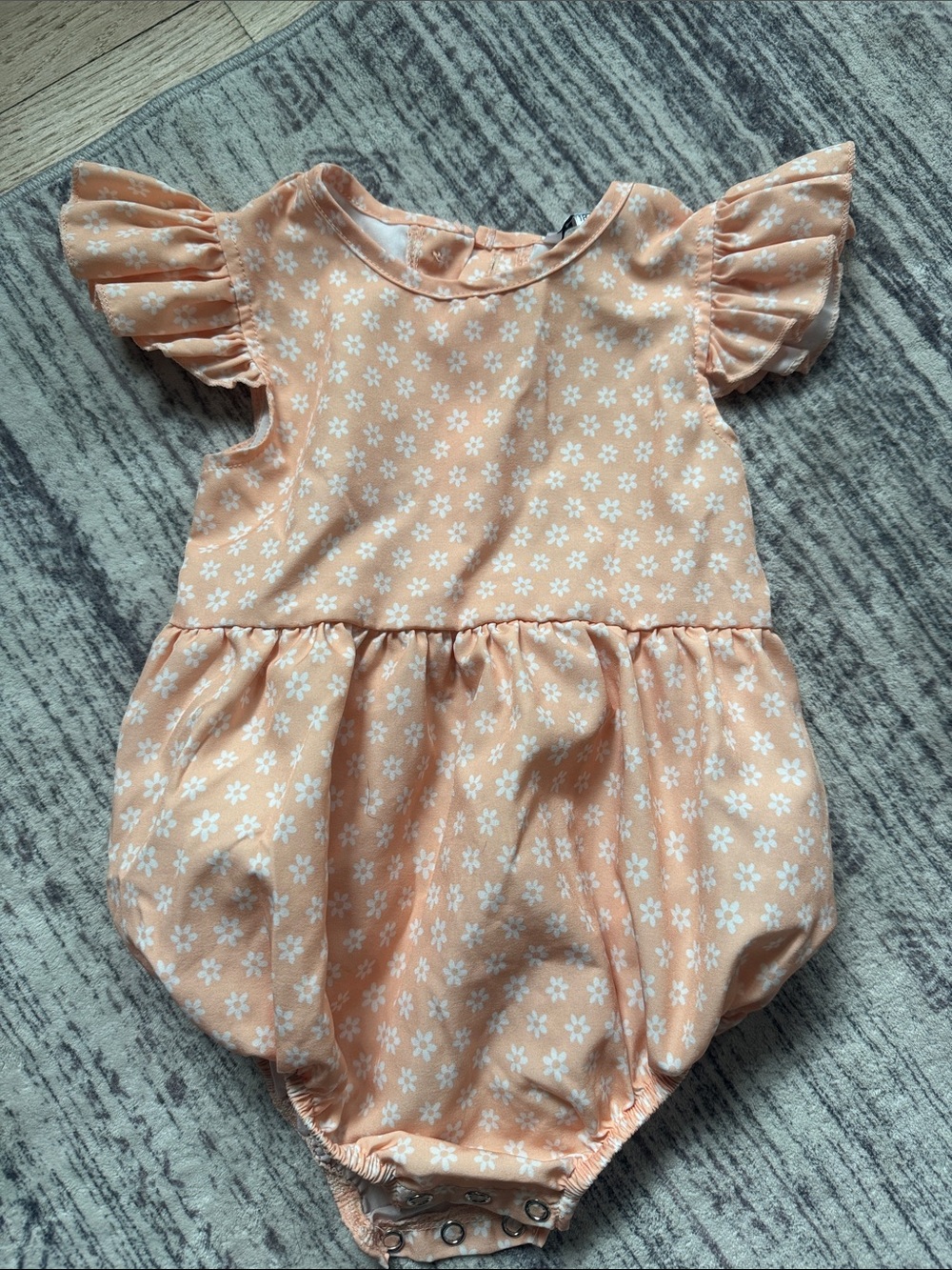 Peach Daisy Baby One-Piece Bodysuit with Ruffle Sleeves